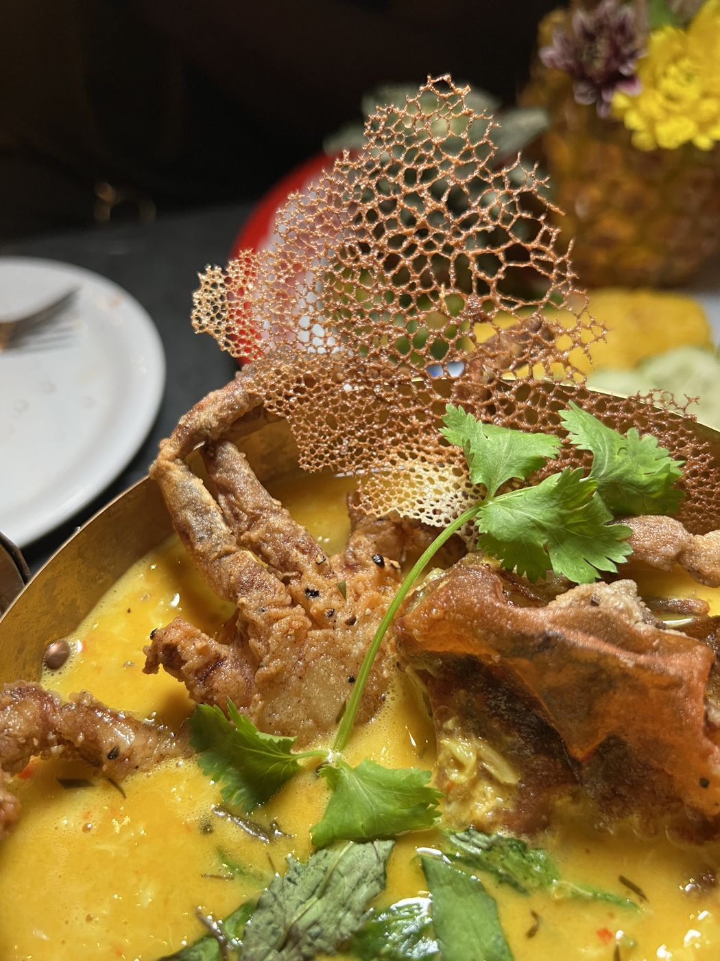 Crab curry with a honeycomb tuile